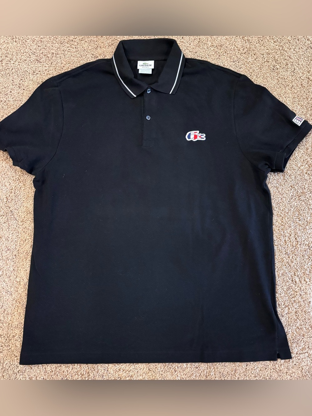 Lacoste Men’s Black Polo with Contrast Trim and Chest Logo, size 7